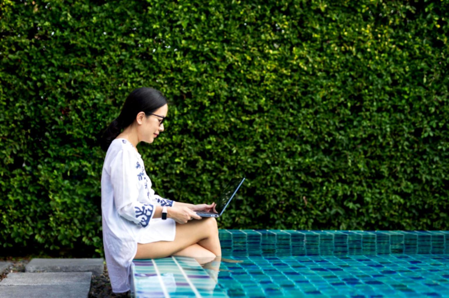 Mobile app development workspace with coding screens